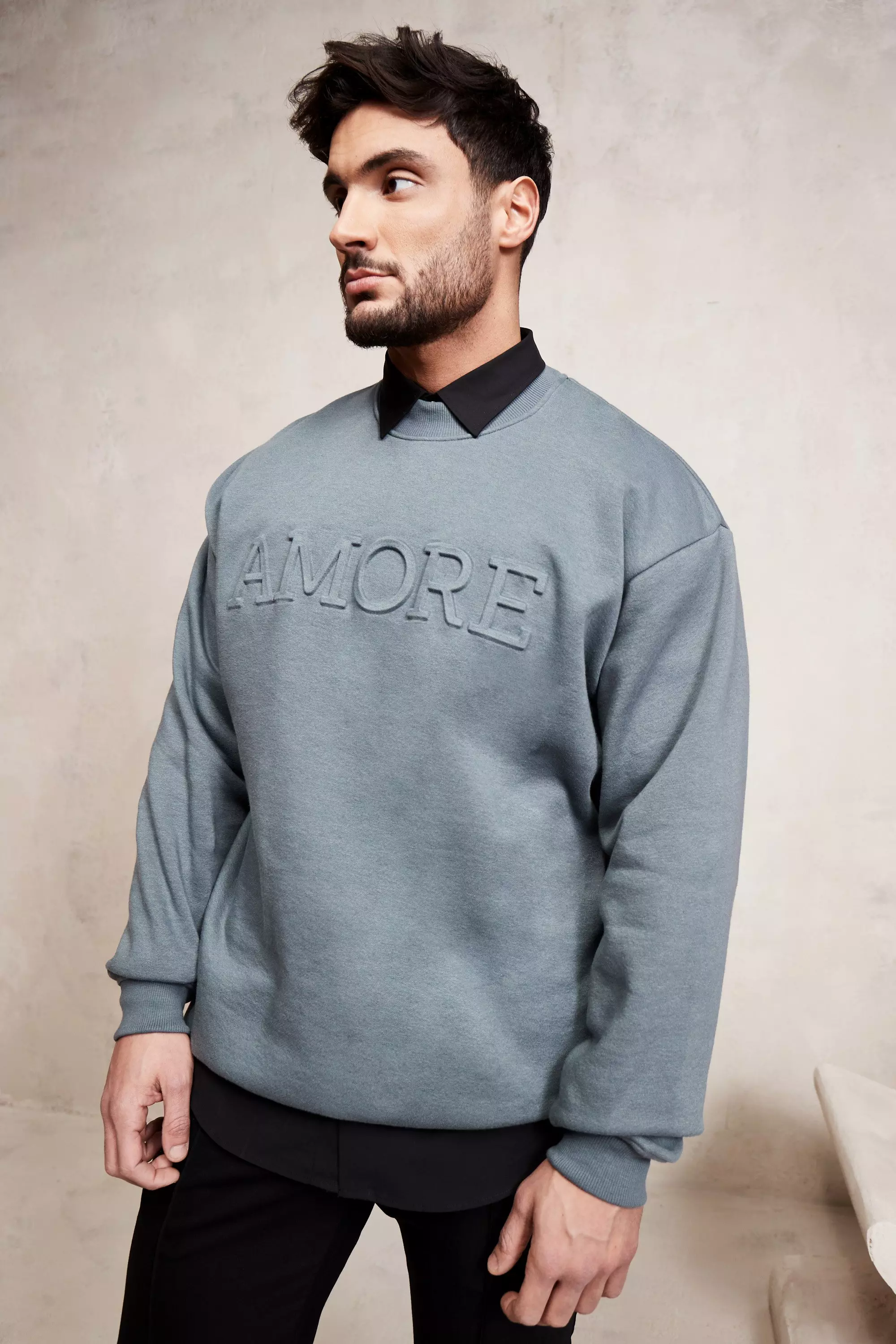 Embossed sweater online